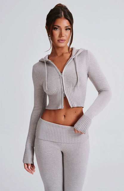 Back view of gray ribbed knit crop hoodie and matching leggings set