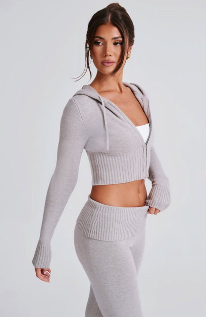 Cream ribbed knit hooded crop jacket with high-waisted flare pants two-piece set