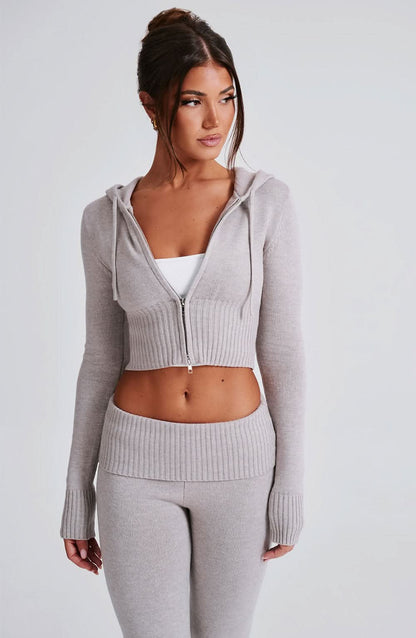 Light gray ribbed knit crop hoodie with drawstring and matching flare leggings