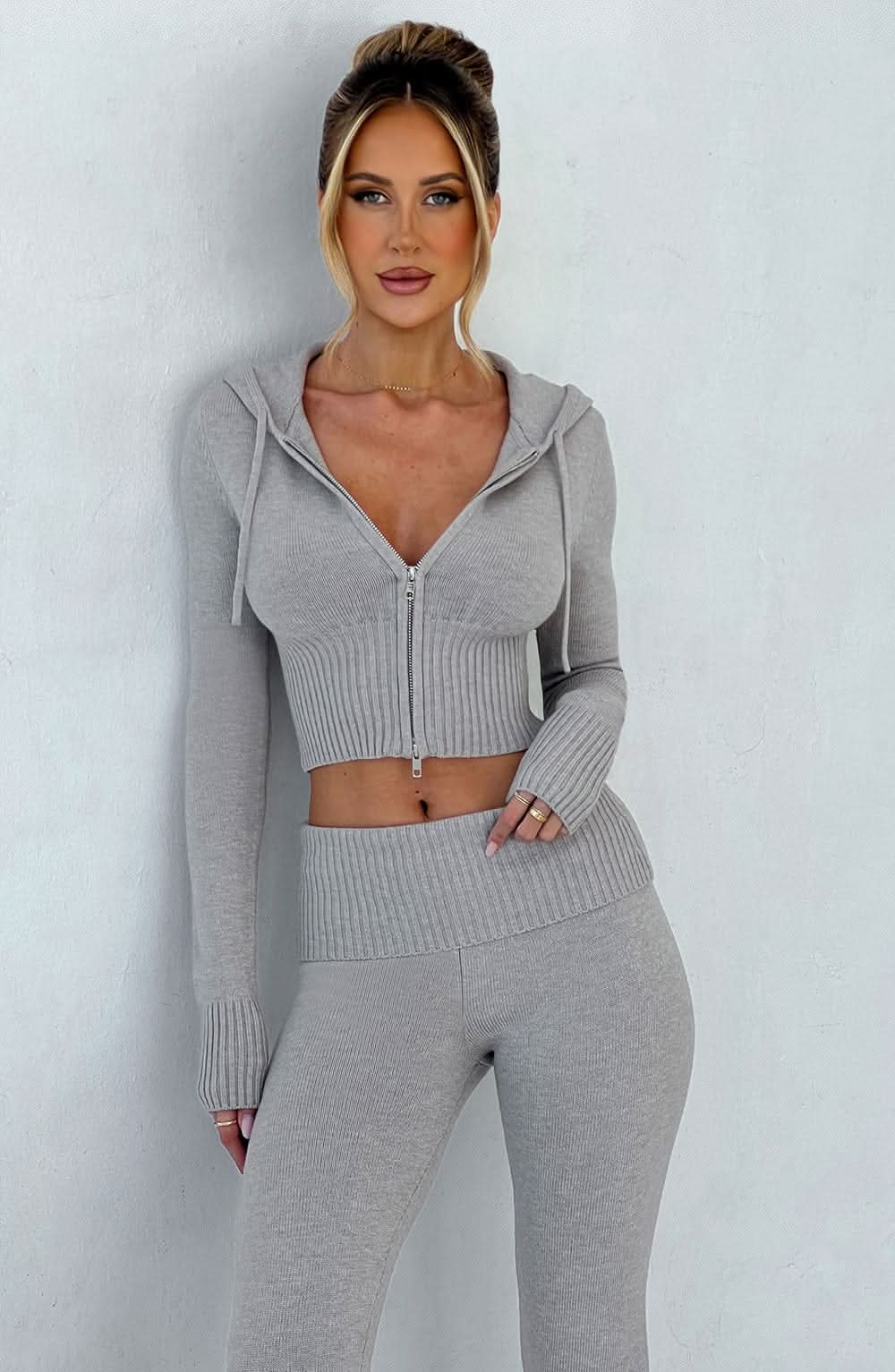 Gray ribbed knit crop hoodie with zip front and matching high-waisted leggings