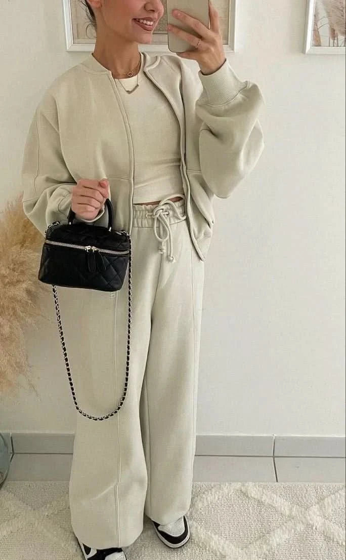 Gray two-piece tracksuit with cropped zip jacket and straight-leg pants