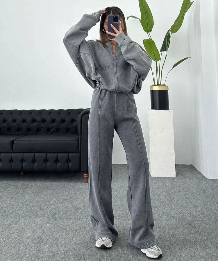Gray tracksuit front view showing zip jacket with drawstring waist pants
