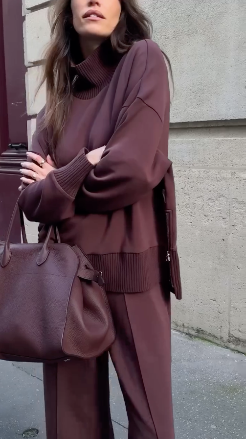 Front view of burgundy knit set with ribbed waistband detail and oversized sweater