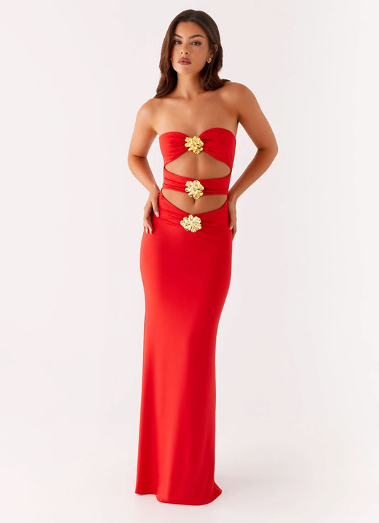 Red strapless maxi dress with gold ornament cutout details and sweetheart neckline