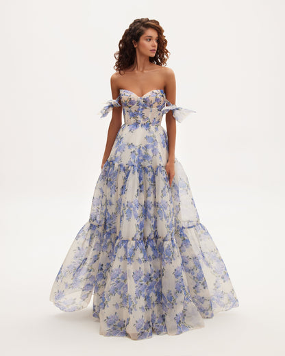 Blue floral off-shoulder maxi dress with tiered skirt and bow sleeves