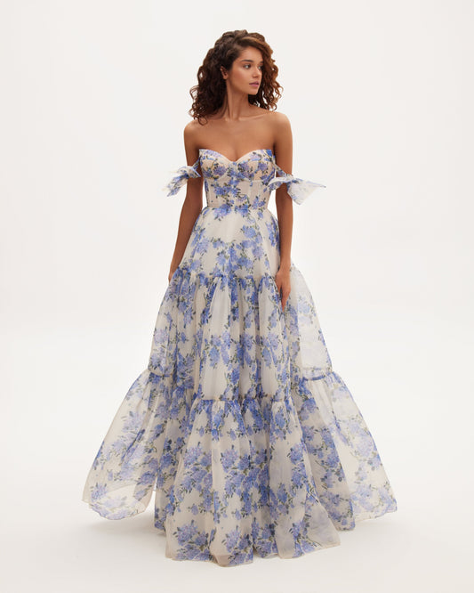 Blue floral off-shoulder maxi dress with tiered skirt and bow sleeves