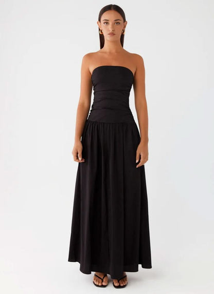 Black strapless maxi dress with ruched bodice and floor-length skirt, straight front