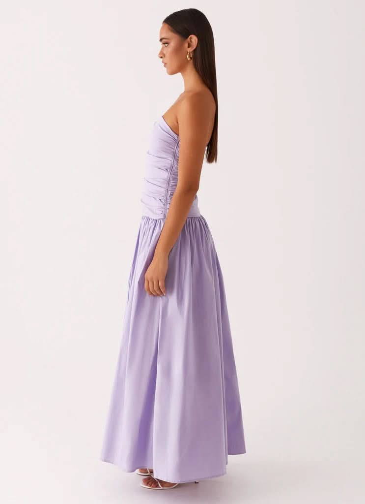 Lavender strapless maxi dress with gathered bodice, side profile showing silhouette