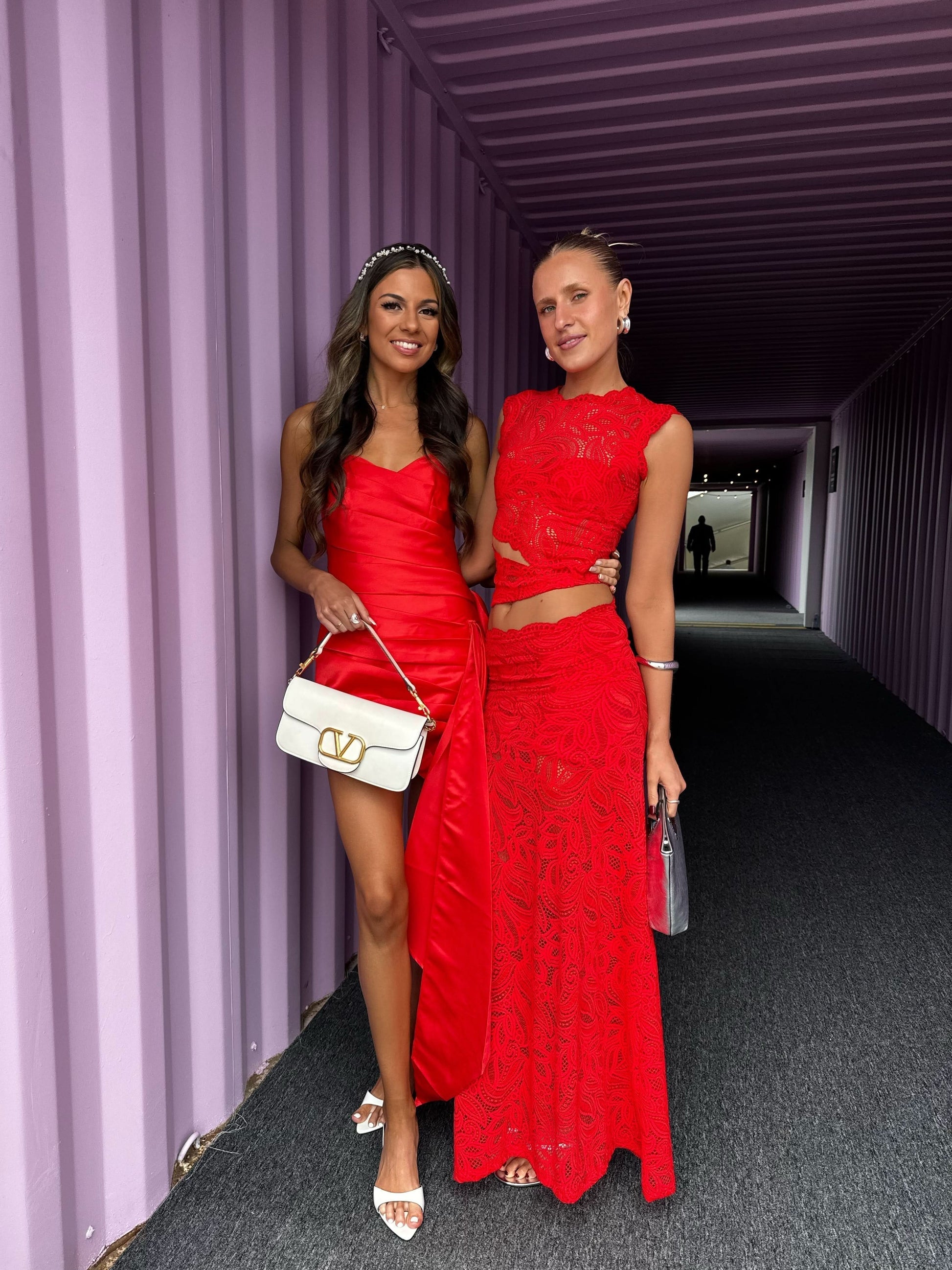 Red lace crop top and mini skirt set with sheer floral pattern and cutout details