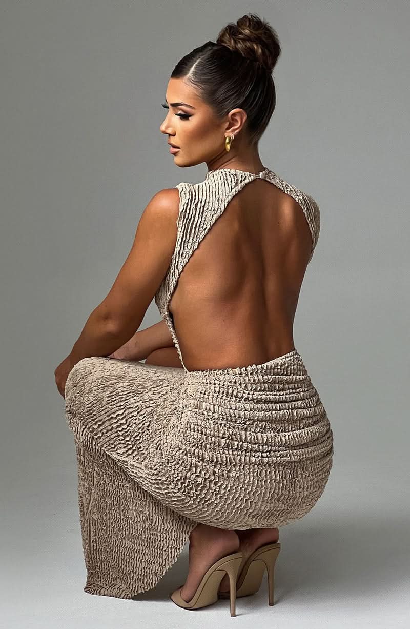Back view of beige textured midi dress with open backless cut