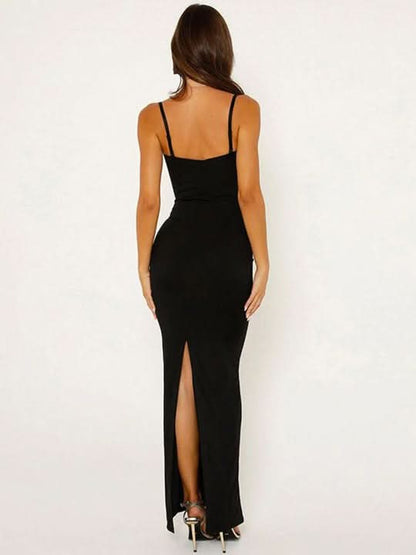 Back view of black maxi dress with open back and rear slit detail