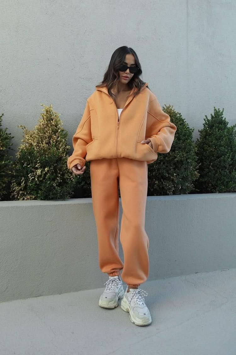 Peach orange tracksuit with full-zip hoodie and relaxed tapered pants