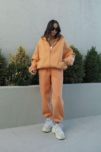Peach orange tracksuit with full-zip hoodie and relaxed tapered pants