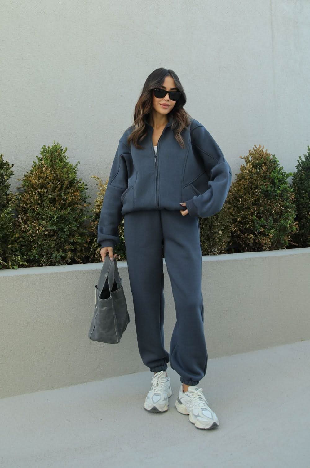 Slate blue zip-up tracksuit with relaxed fit and jogger pants
