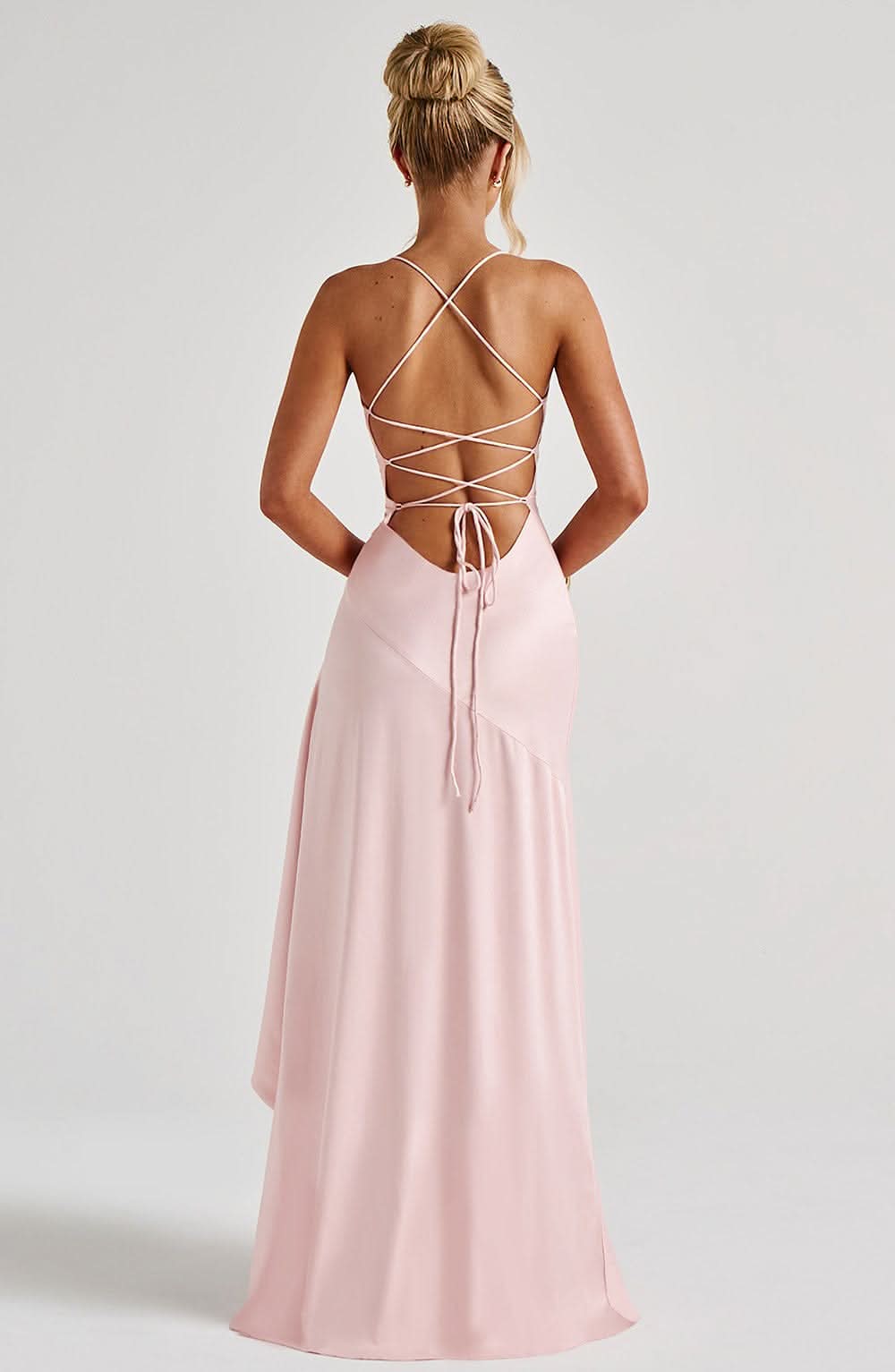 Pink maxi dress with crisscross lace-up back and flowing skirt
