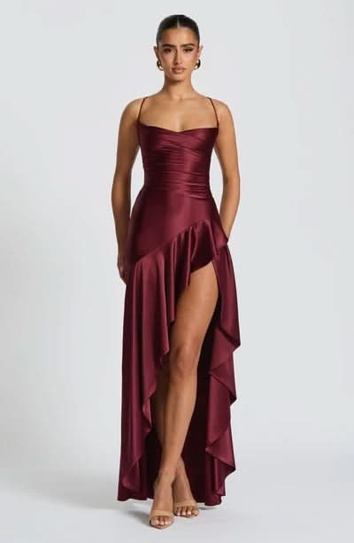 Light pink maxi dress with sweetheart neckline and asymmetrical ruffle hem