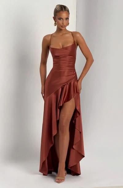 Burgundy satin maxi dress with ruched bodice and dramatic side slit
