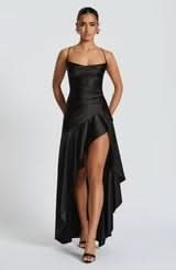 Black satin maxi dress with fitted bodice and asymmetrical draped skirt