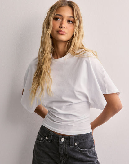 White wide sleeve tee front detail showing sleeve volume