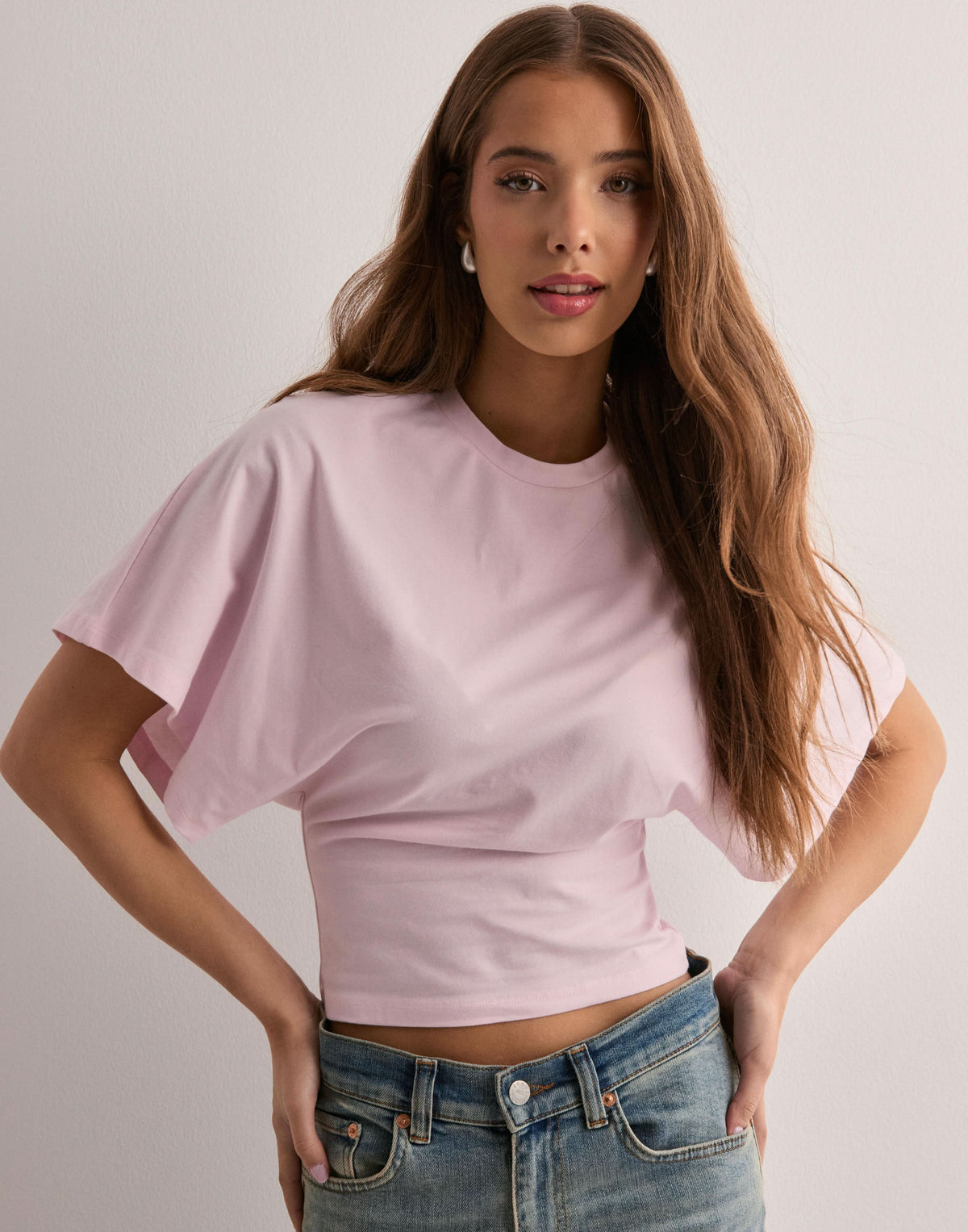 Light pink wide sleeve tee front view with relaxed silhouette