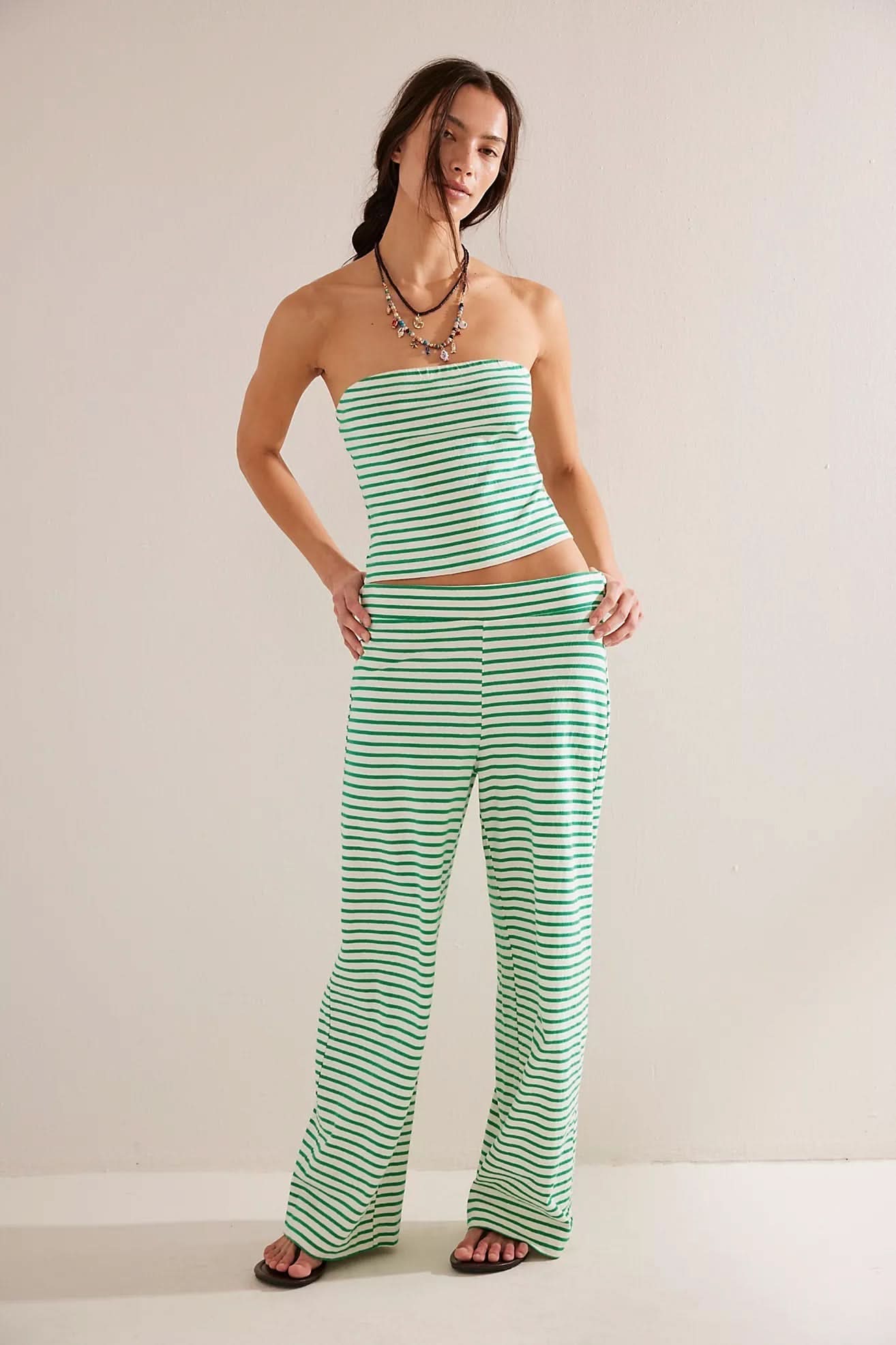 Green and white striped strapless crop top with matching wide-leg pants