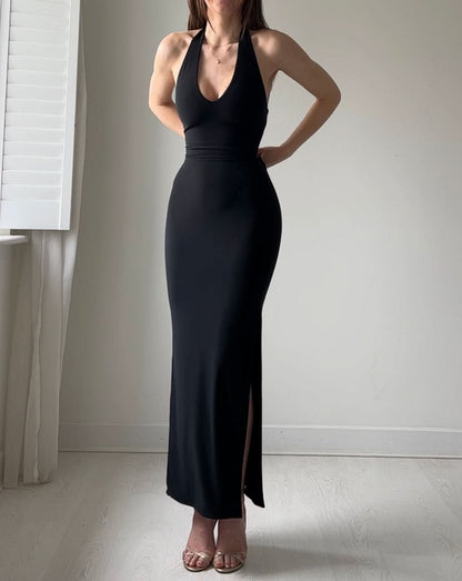 Black halter maxi dress with ruched waist and front slit