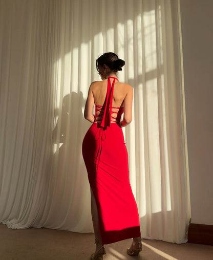 Black halter maxi dress with ruched waist and front slit