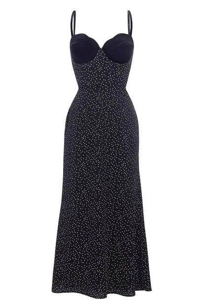 Black polka dot midi dress flat lay detail showing velvet neckline and fit