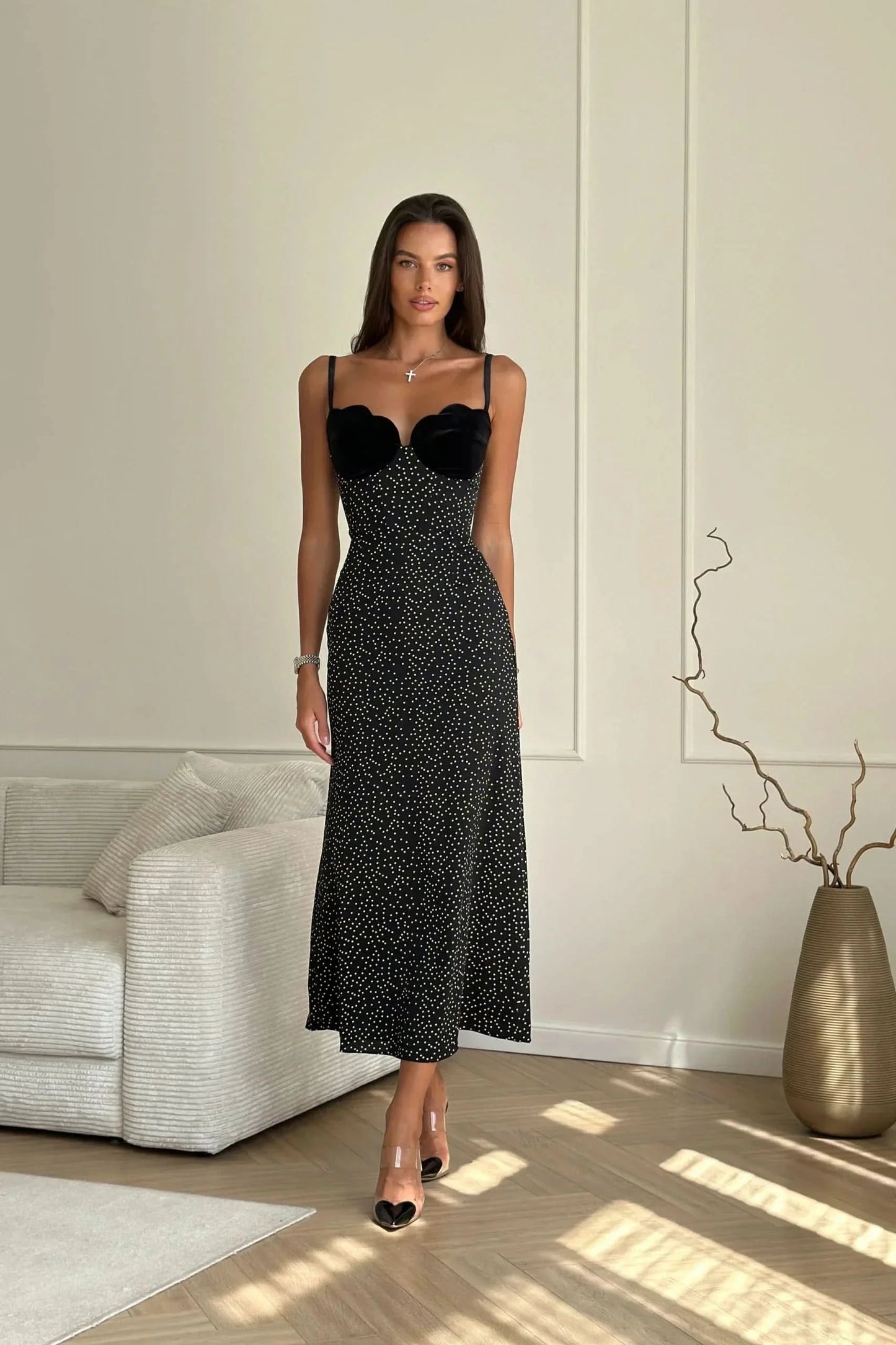 Black polka dot midi dress with velvet sweetheart neckline and spaghetti straps