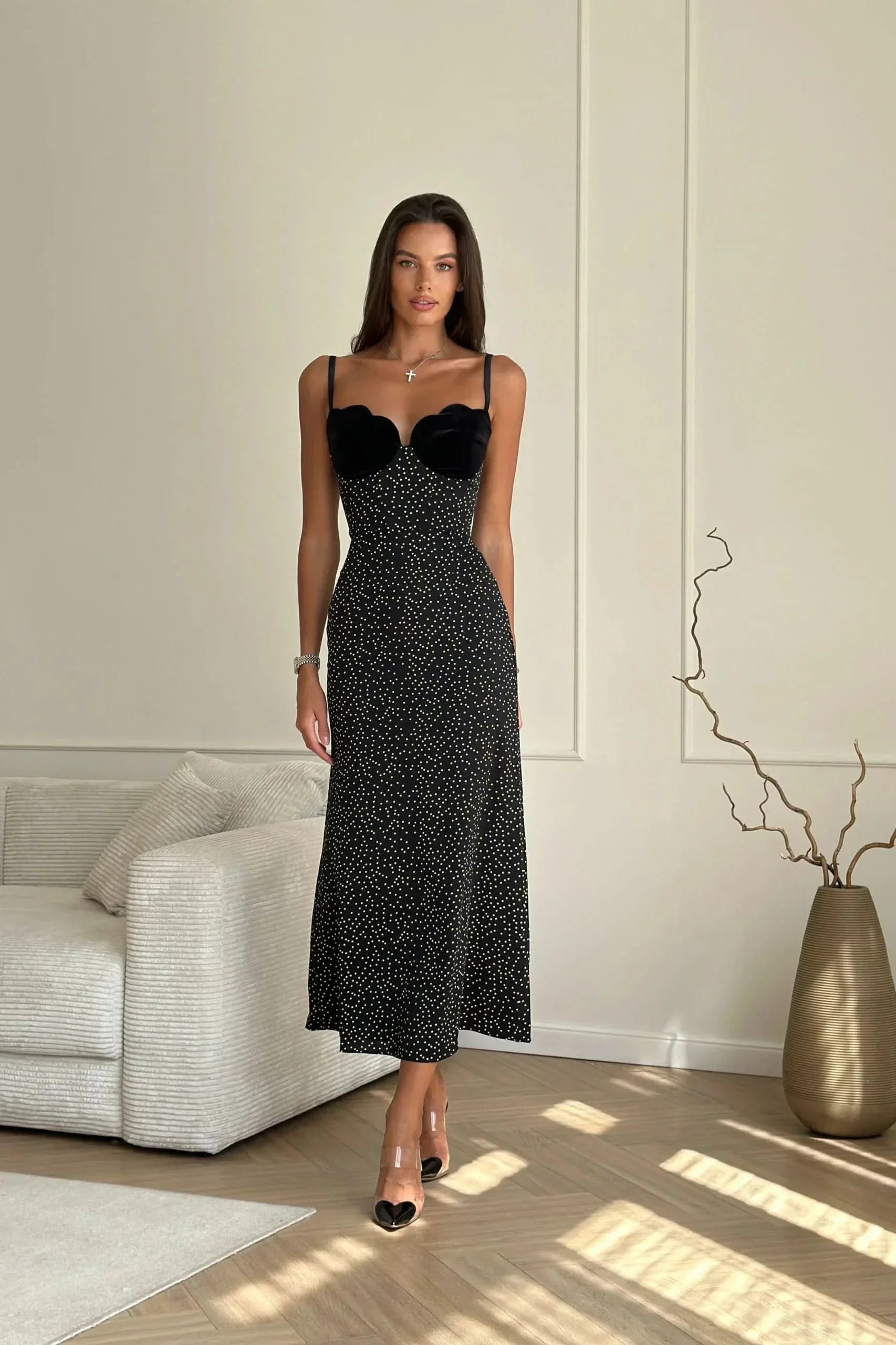 Black polka dot midi dress with velvet sweetheart neckline and spaghetti straps