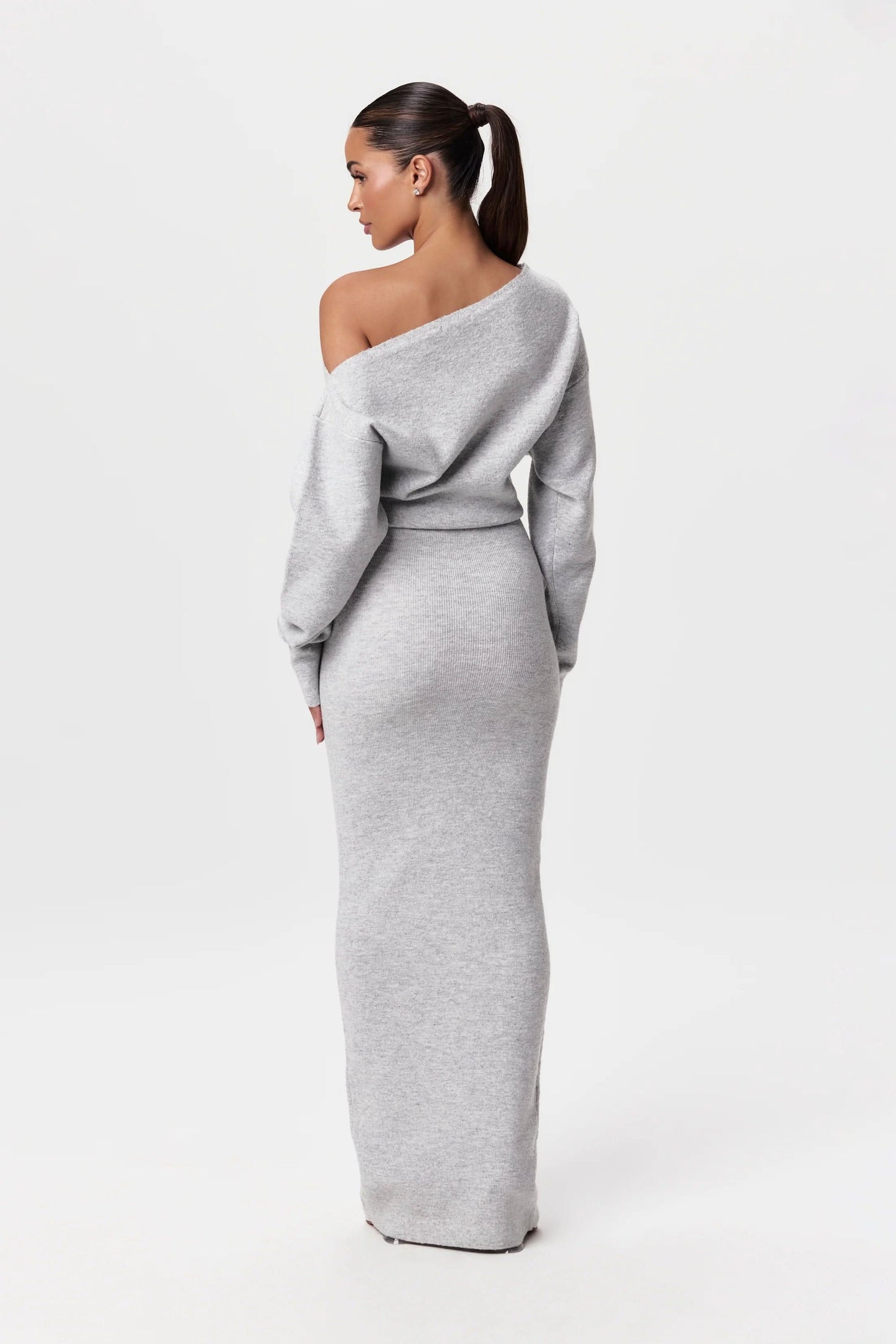 Gray off-shoulder knit maxi dress with voluminous long sleeves, back view