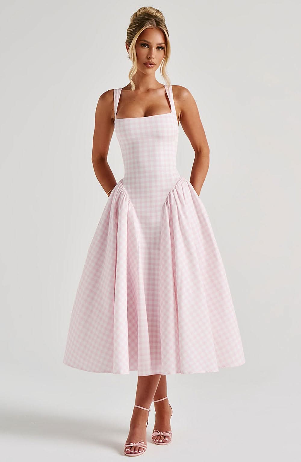 Pink checkered midi dress with fitted bodice and voluminous skirt