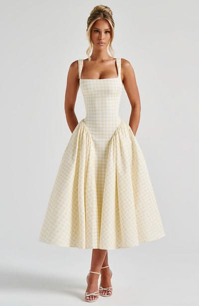Ivory checkered midi dress with fitted bodice and pleated skirt