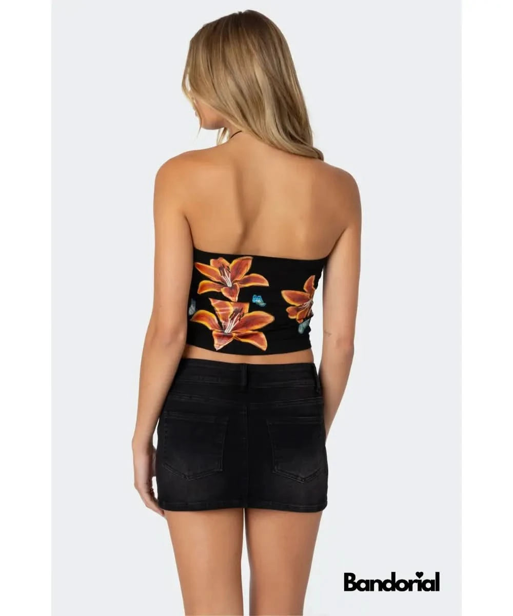 Black tube top with orange lily flowers and blue butterflies, back view