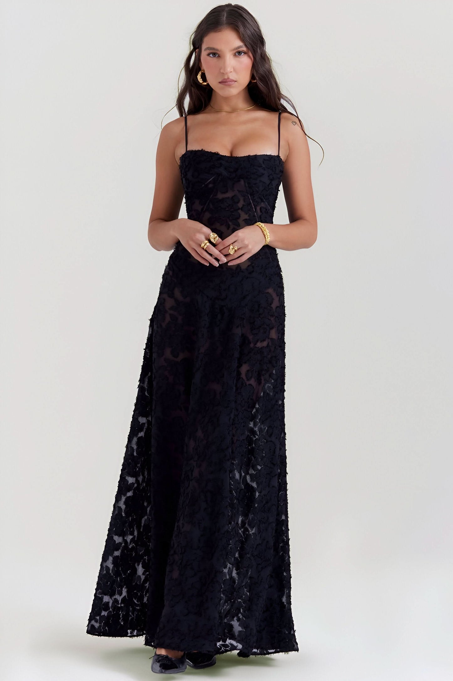 Black textured lace maxi dress with sweetheart neckline and spaghetti straps