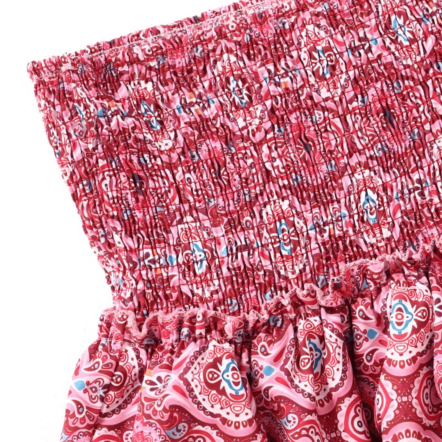 Close-up of pink ornamental patterned mini skirt with decorative ruffle details
