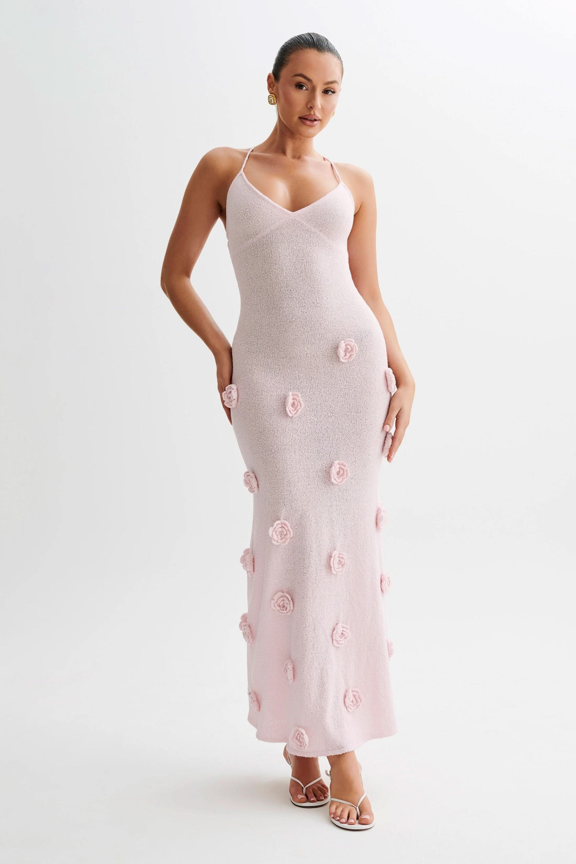 Pink maxi dress with 3D floral appliqués and V-neckline