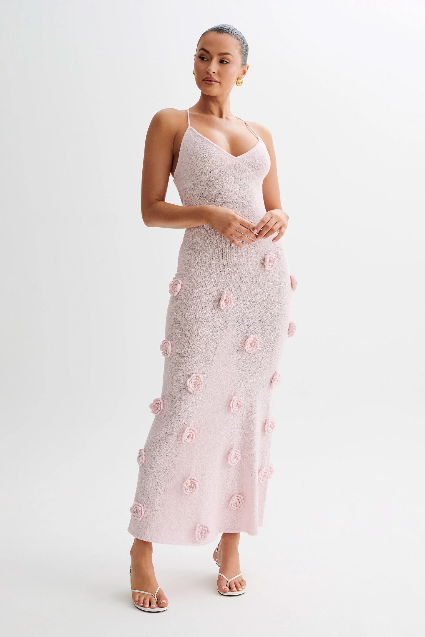 Light pink knit maxi dress with textured rose details