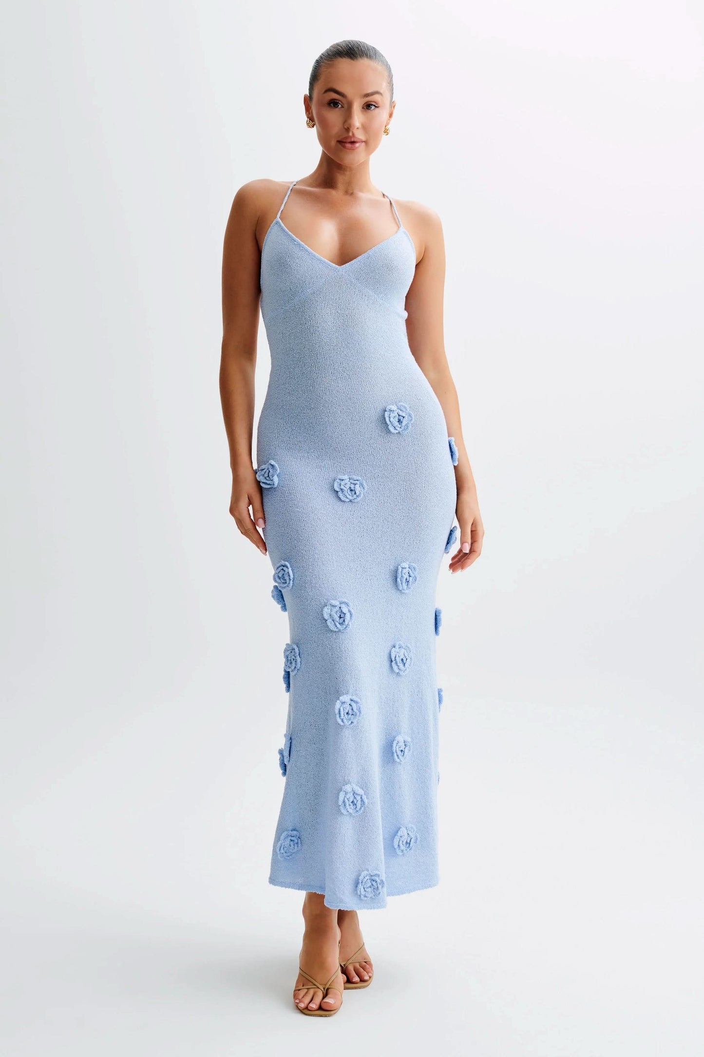 Light blue knit maxi dress with 3D floral embellishments