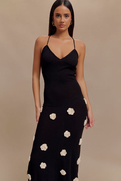 Black ribbed maxi dress with scattered cream flower details