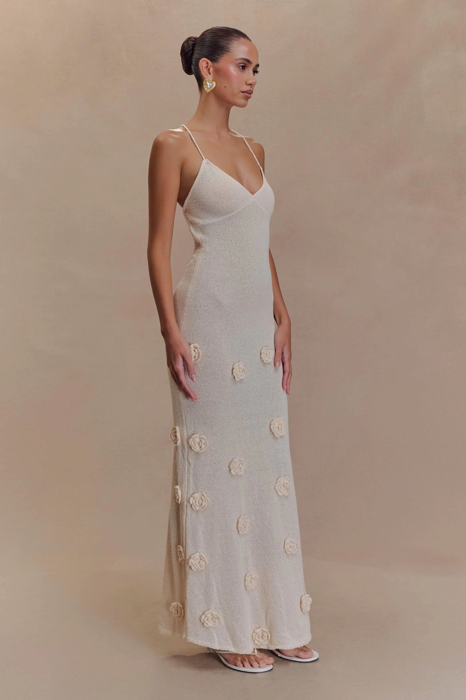 Cream ribbed maxi dress with cream flower details, side profile