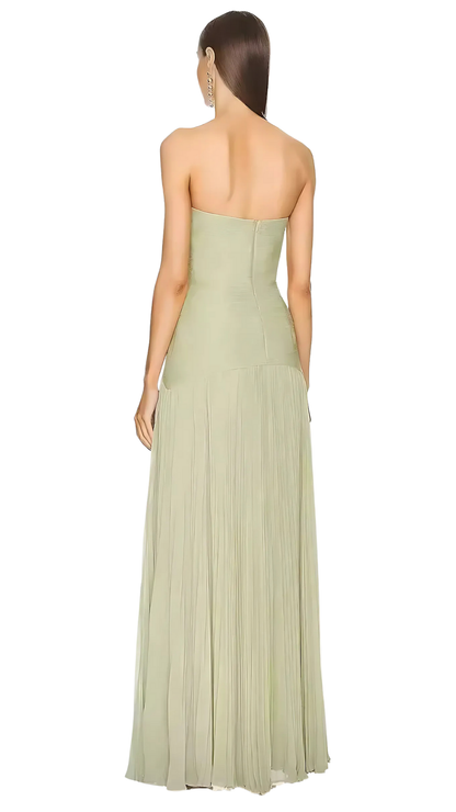 Back view of sage green strapless maxi dress with center seam