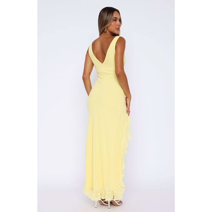 Back view of yellow sleeveless maxi dress with deep v-neckline