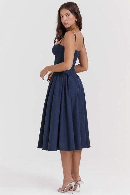 Navy blue strapless midi dress with full pleated skirt, side view
