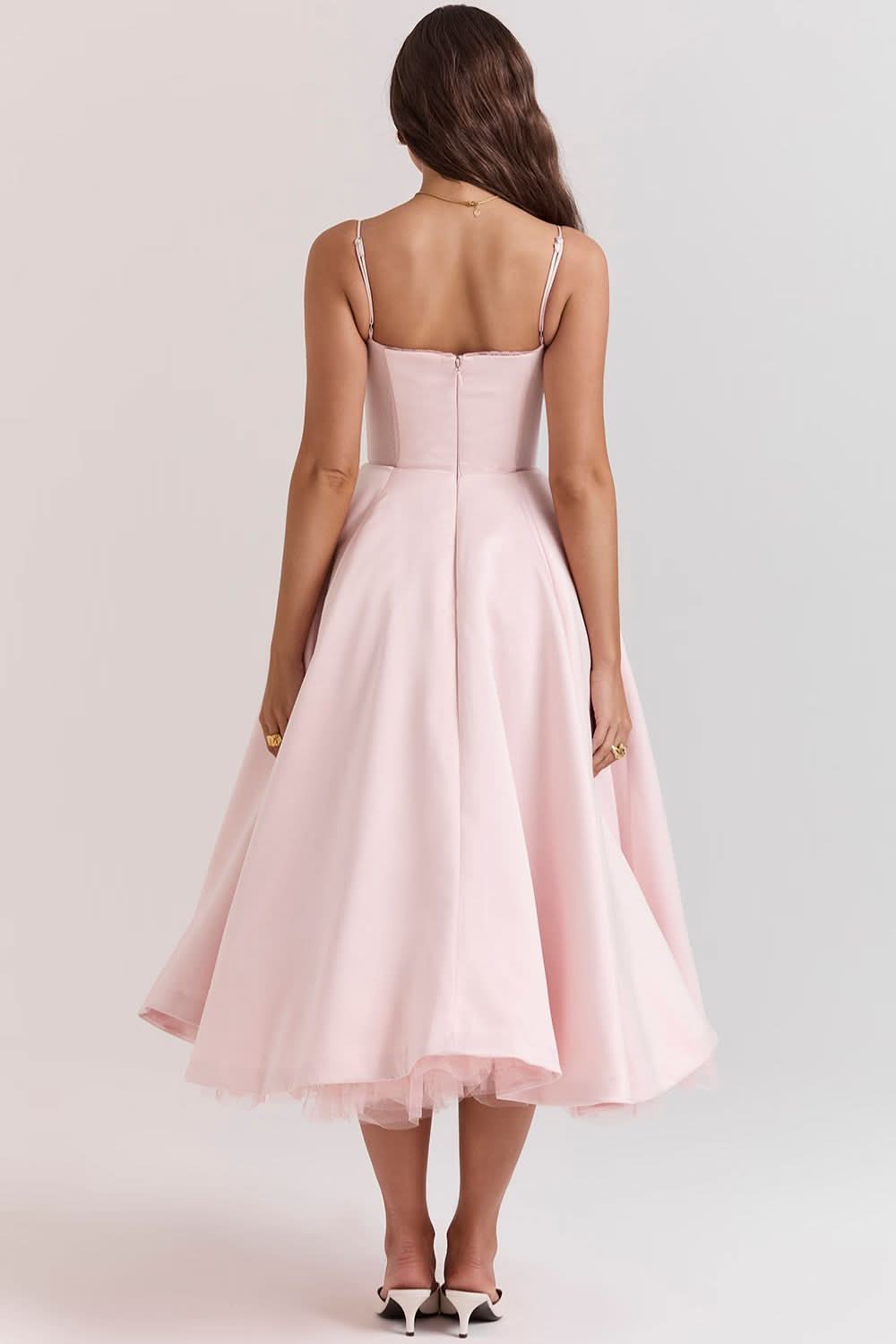 Rear angle of pink sweetheart midi dress with tulle underskirt detail
