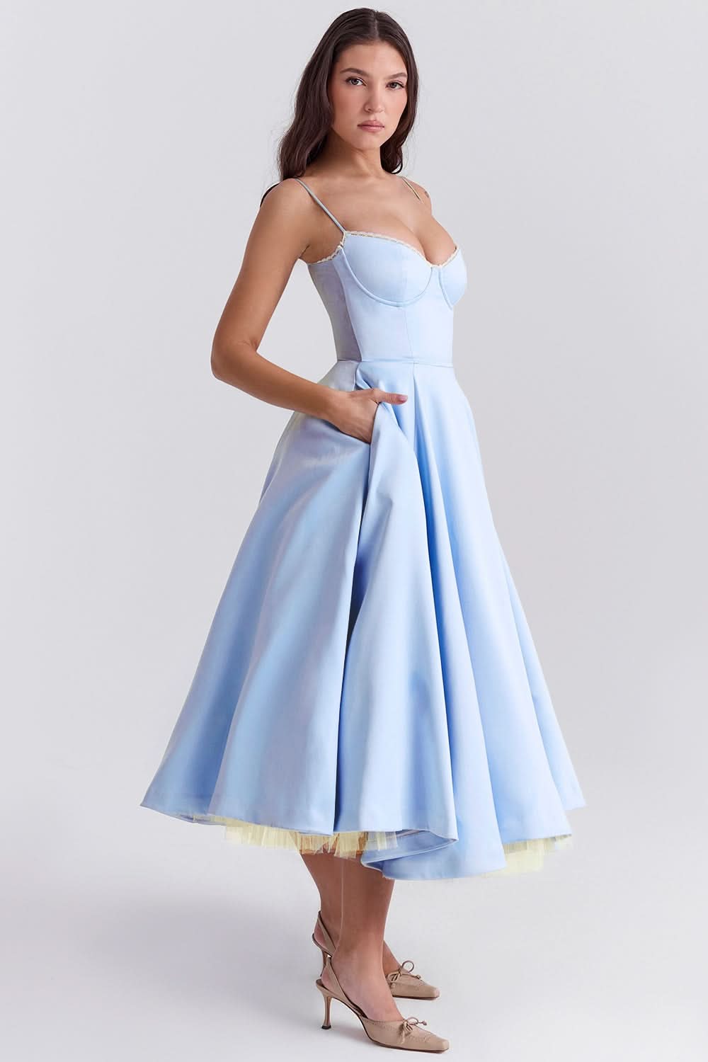 Light blue sweetheart midi dress with full skirt and yellow tulle hem