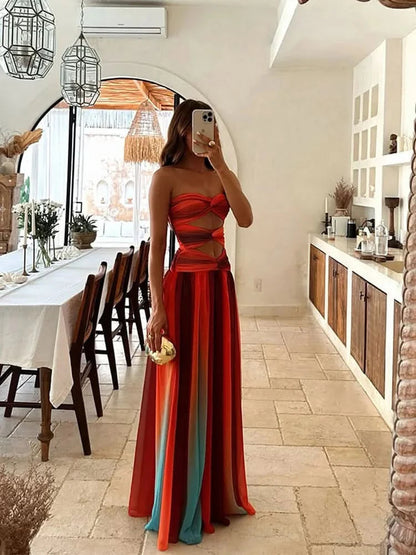 Back view of red ombré floor-length maxi dress with strapless neckline for women
