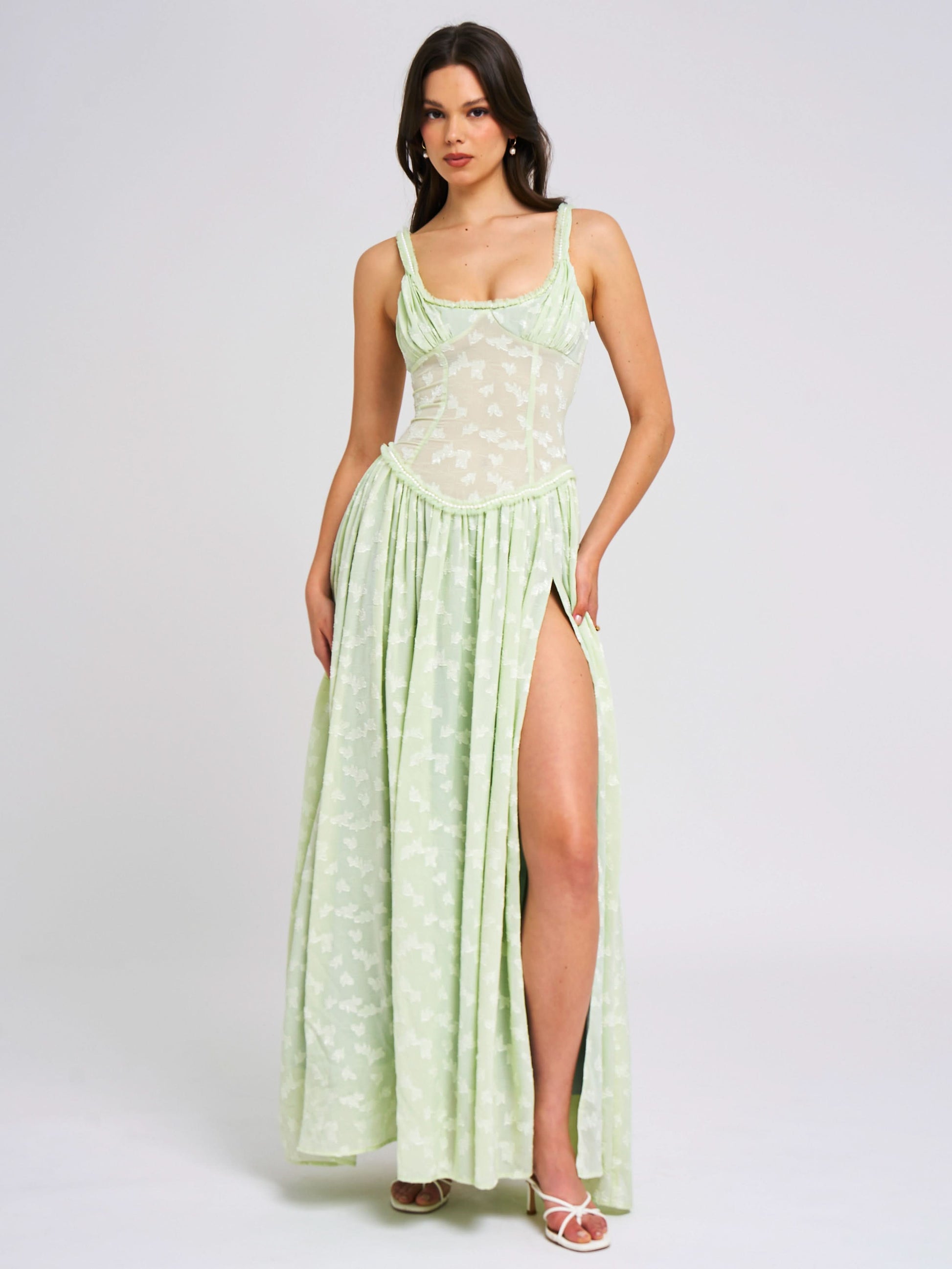 Light green floral maxi dress with corset bodice and high slit