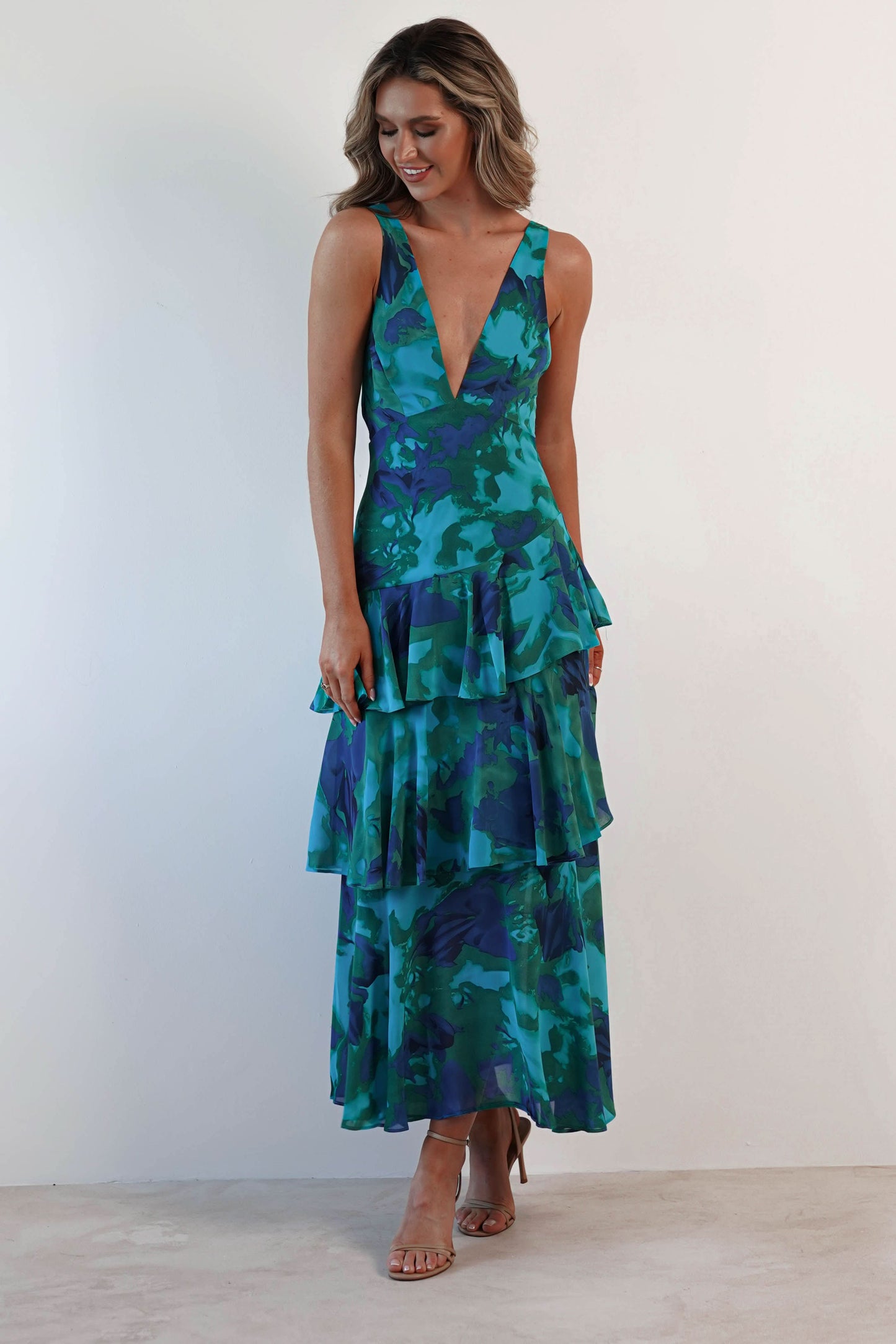Teal and navy floral ruffle midi dress with tiered layered skirt