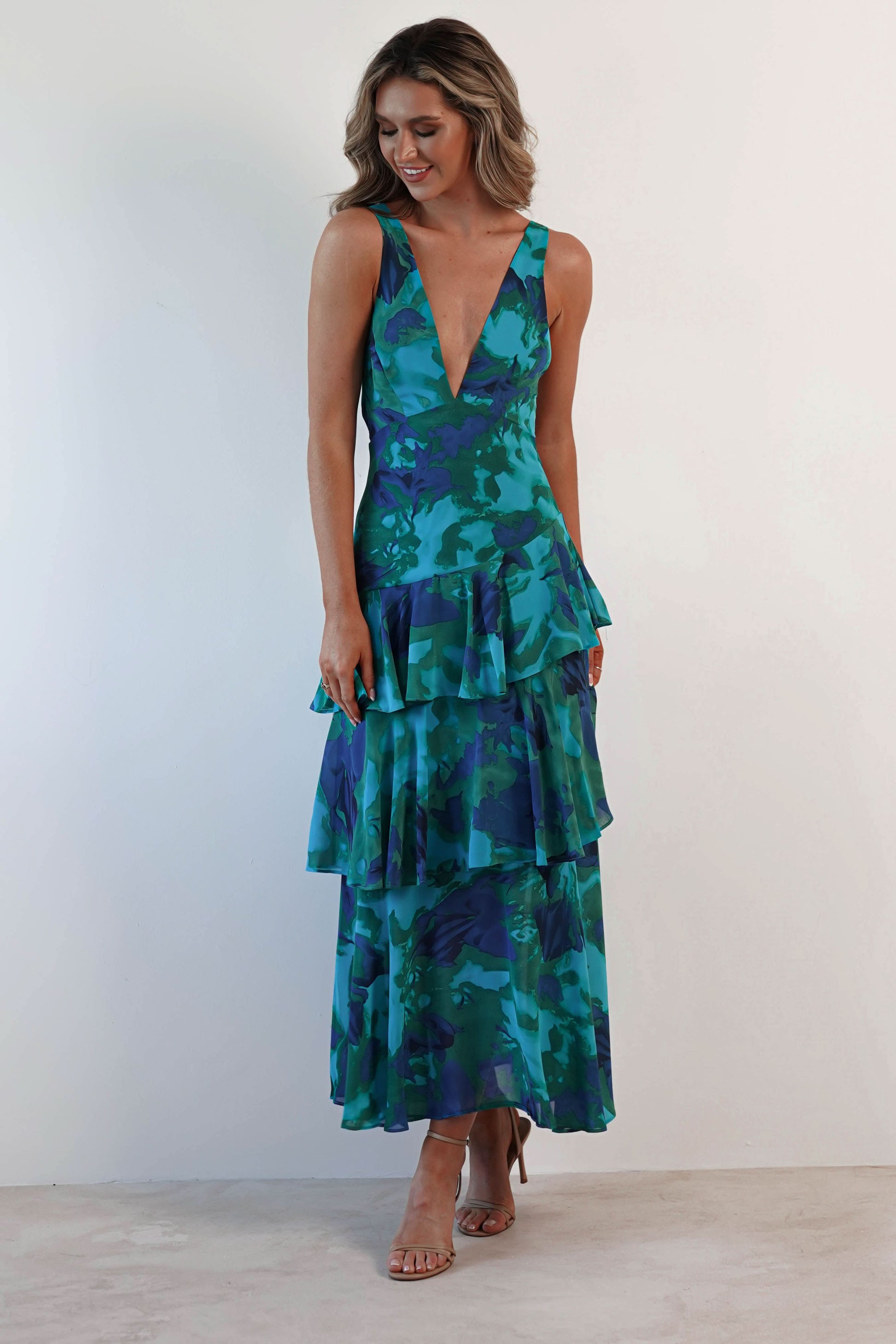 Teal and navy floral ruffle midi dress with tiered layered skirt